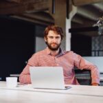 portrait-of-young-caucasian-businessman-using-lapt-2023-11-27-05-12-16-utc-1-1.jpg